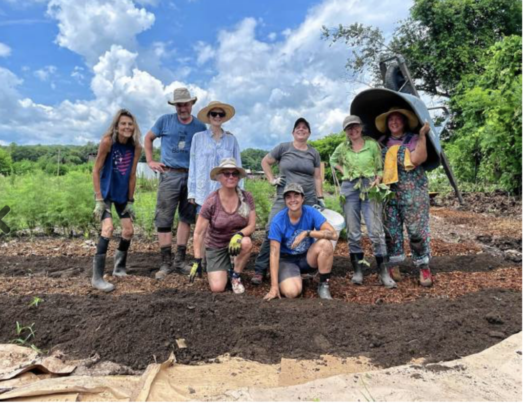 Photo of staff and volunteers who helped Grow Food Northampton farmers and gardeners recover from the flooding in July, 2023